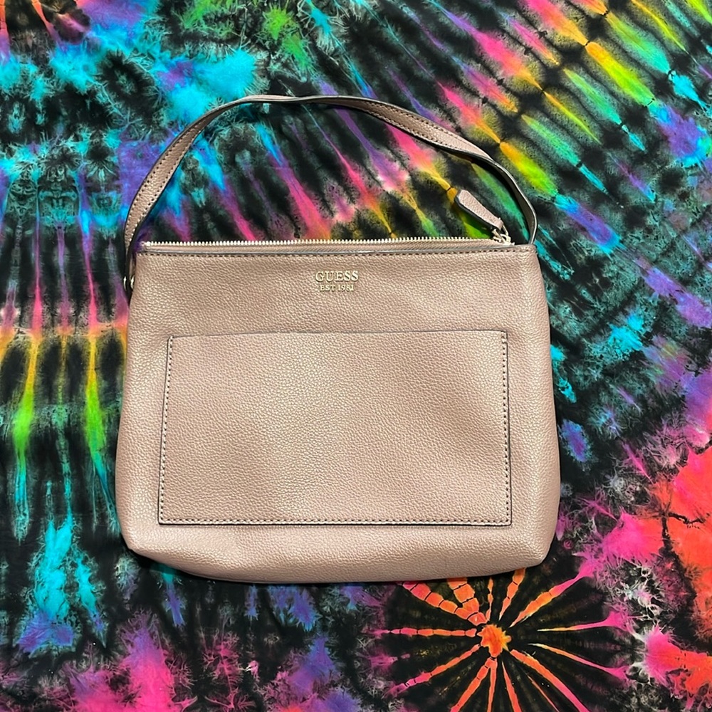 Guess // mauve clutch strap bag. last picture with Sharpie for scale